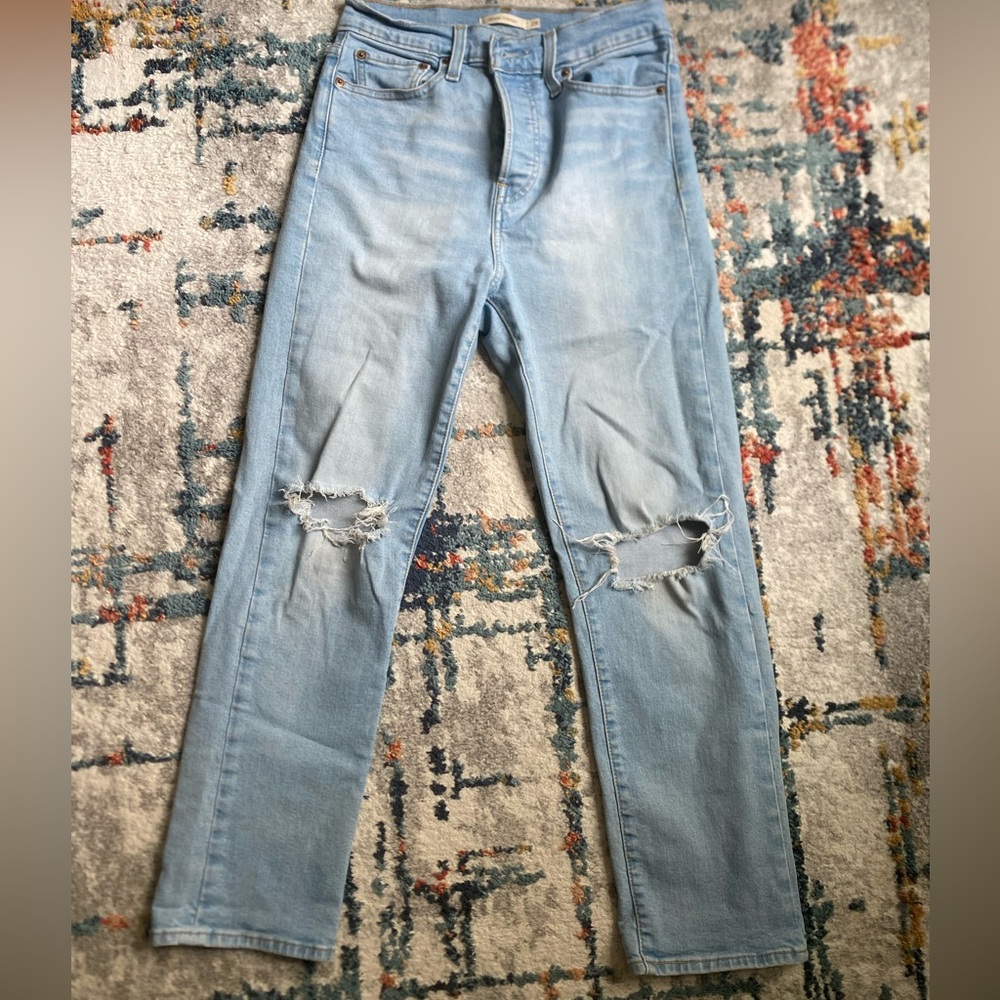 Levi’s Light Blue distressed Button-Fly Jeans